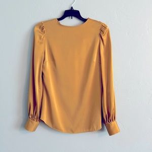 Kate Spade satin blouse with twisted V back neckline